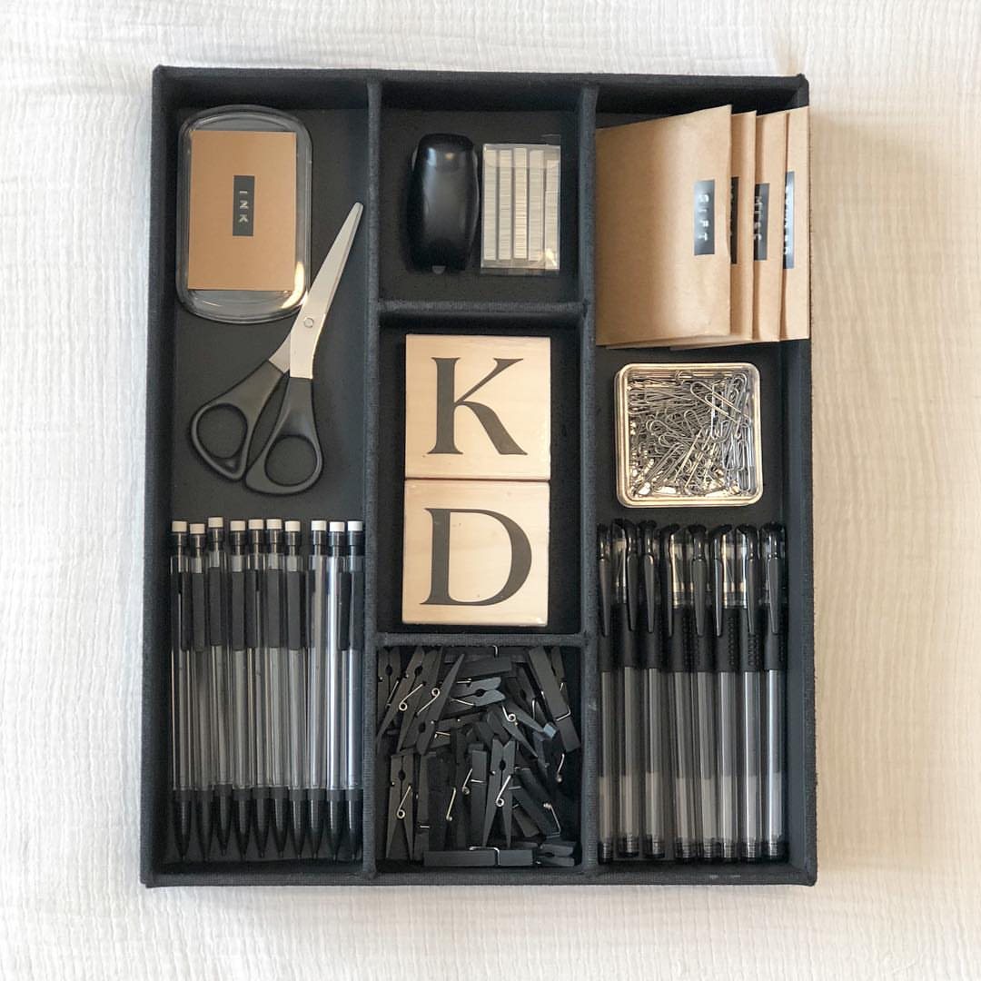 11 Desk Organization Ideas That Tidy Your Space for 2026 3 Black drawer organizer filled with neatly arranged pens, scissors, paper clips, and other office supplies.