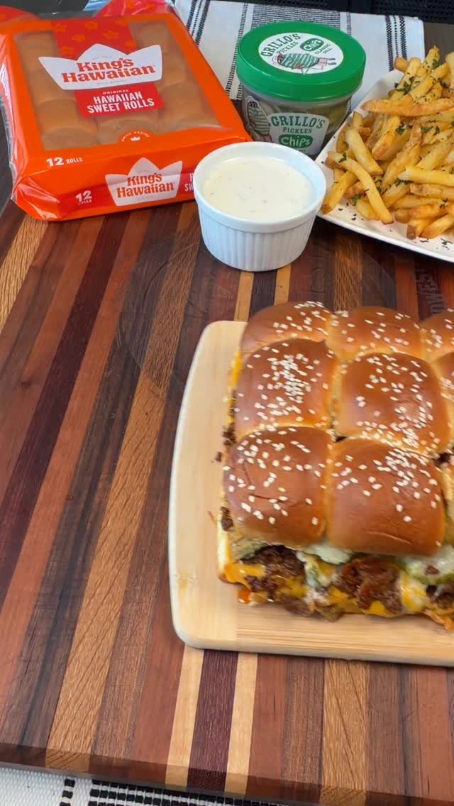 14 Ground Beef Recipes Using Few Ingredients for Low-Stress Weeknights 2 Pull-apart sliders with sesame seed buns and melted cheese served with fries and rolls.