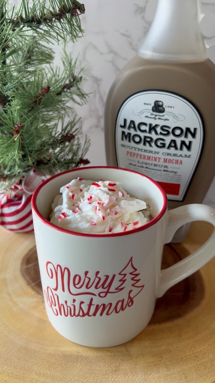 Candy Cane Themed Party: 9 Ideas for Decor and Desserts 5 A white Christmas mug filled with hot chocolate, whipped cream, and crushed peppermint pieces.