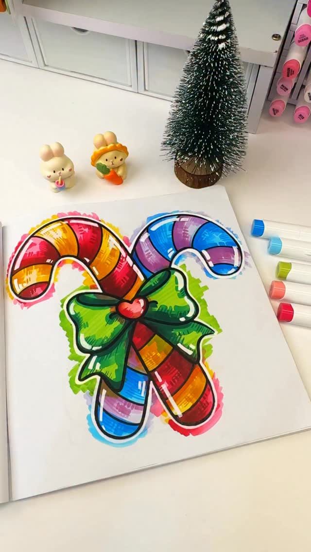 10 December Coloring Pages for Cozy Winter Days 8 Two colorful striped candy canes tied with a green bow on a white coloring page.