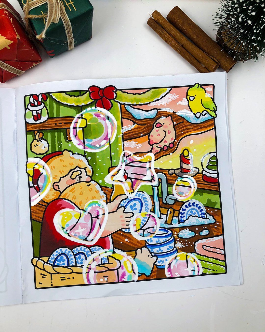 10 December Coloring Pages for Cozy Winter Days 3 Santa Claus coloring illustration with colorful bubble stickers on a white paper background.