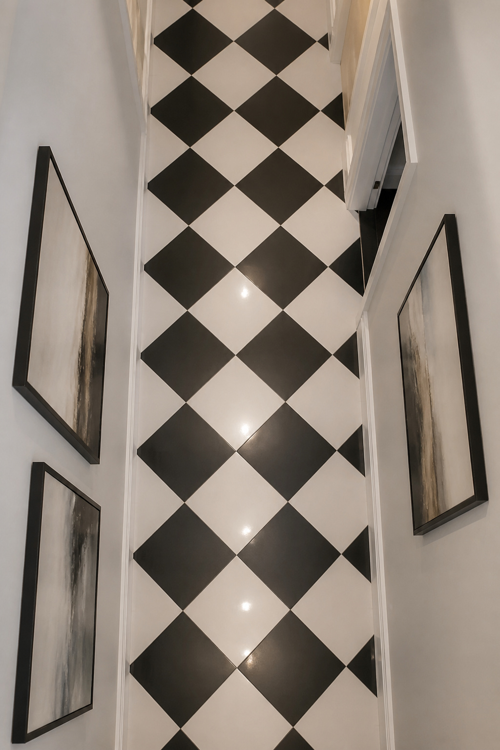Straight grid layout of checkered tiles in a kitchen.