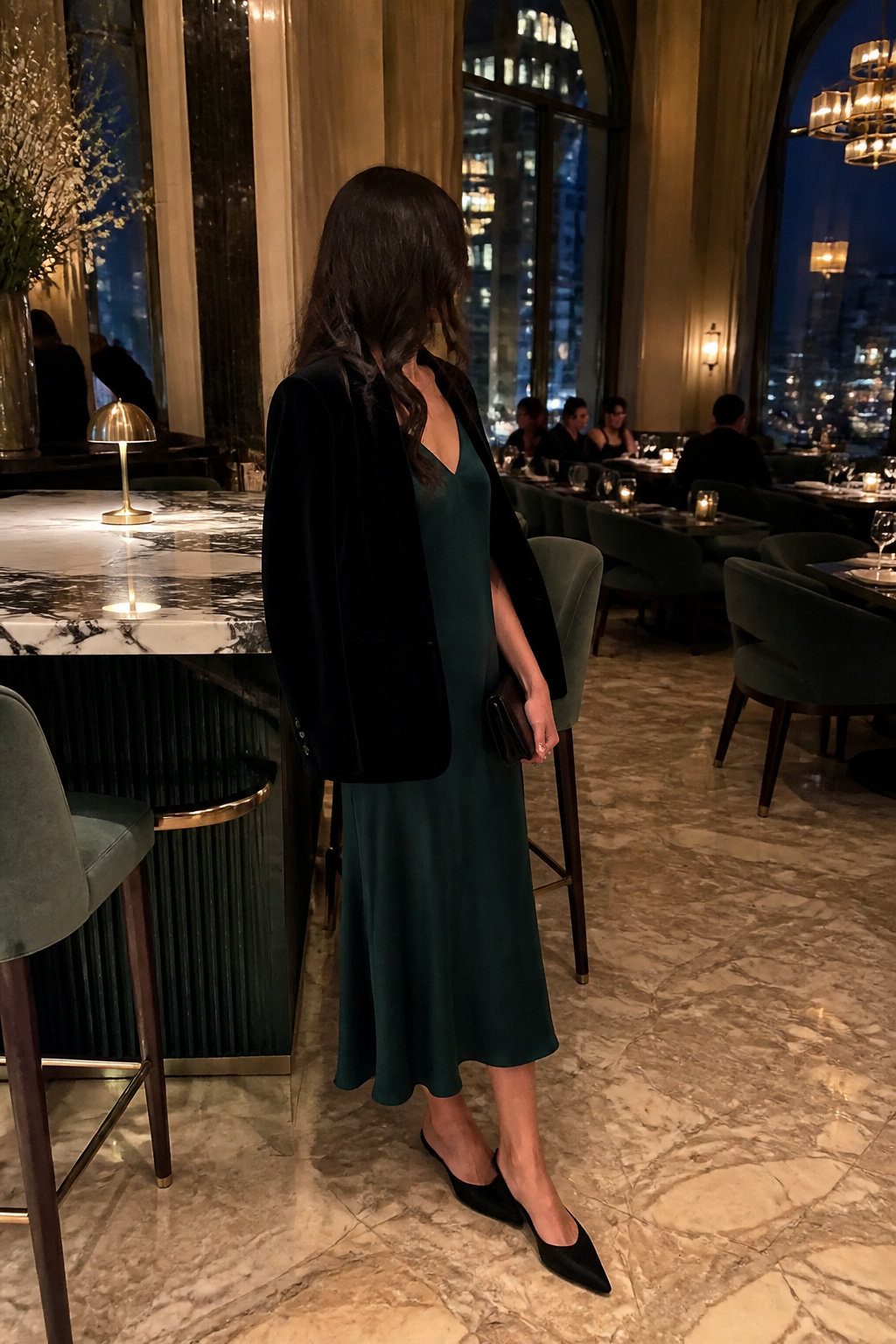 Jewel-toned midi dress complemented by a tailored velvet blazer.