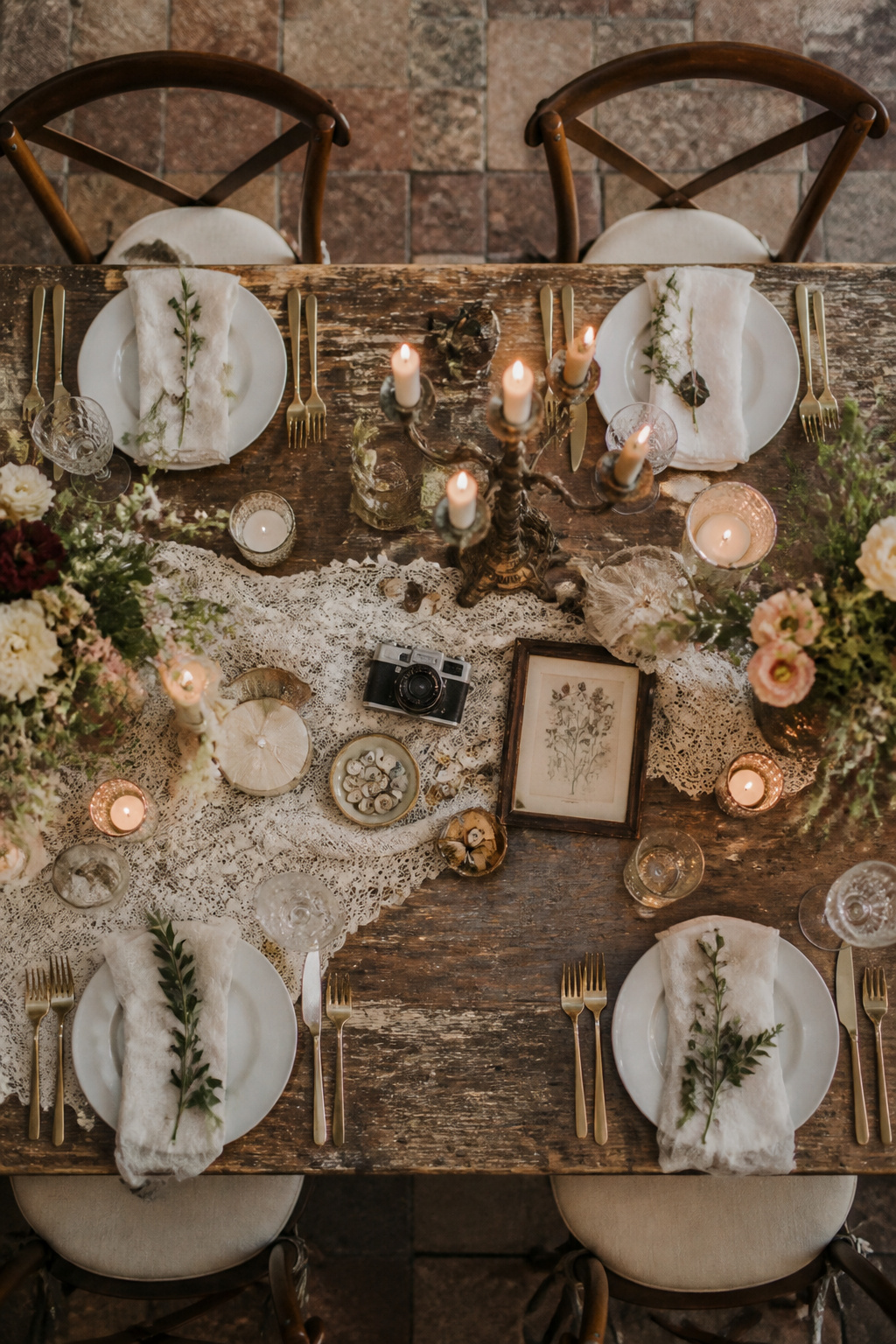 Decor featuring vintage and modern pieces in a wedding setting.