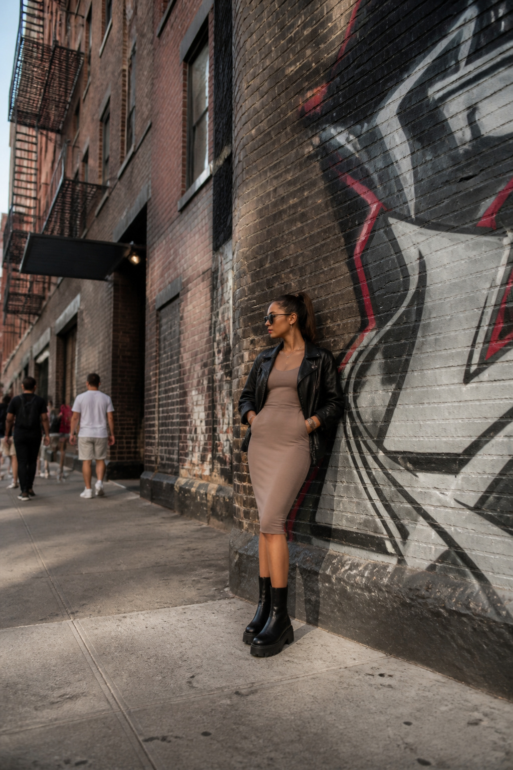 Bodycon Dresses: Fits, Lengths and How to Style Them 40 Bodycon dress paired with a leather jacket and accessories.