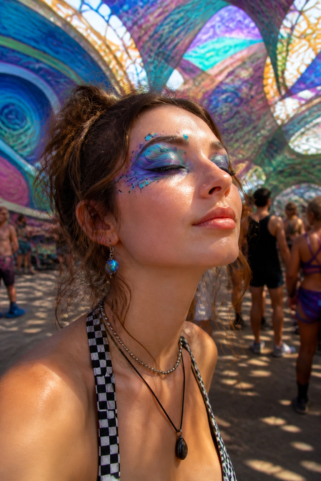 19 Festival Makeup Looks and Ideas for 2026: From Edgy to Boho 8 Model with colorful, distorted designs drawn on her eyelids.