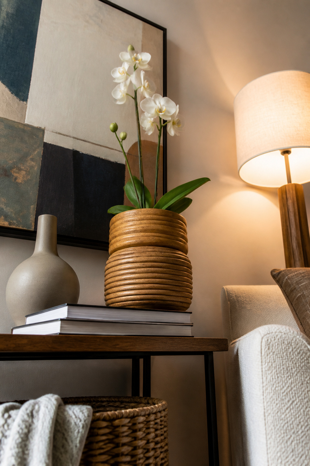 Wood ring planters stacked to form a hollow column with a plastic pot inside.