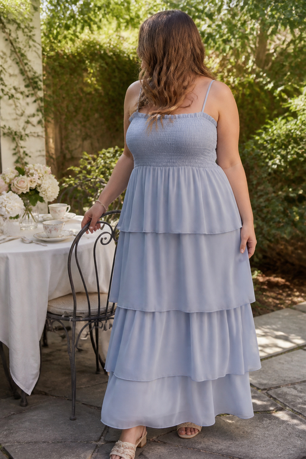 Tiered chiffon maxi dress with a softly shirred bodice displayed.