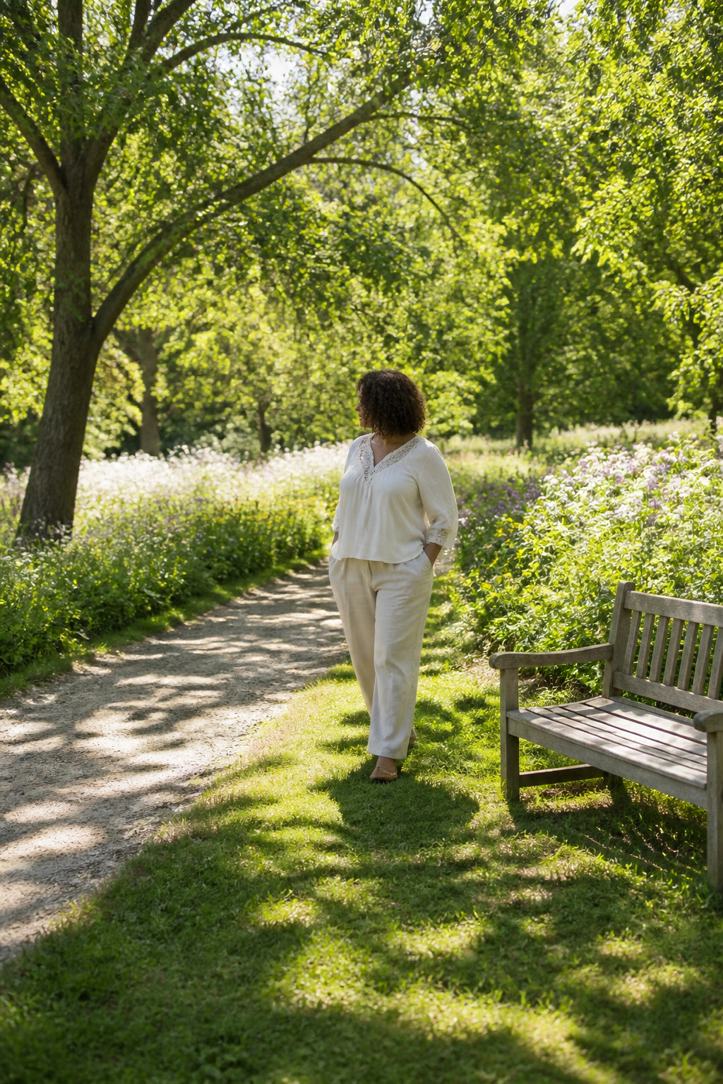 A boho blouse and straight-leg linen pants styled together outdoors.