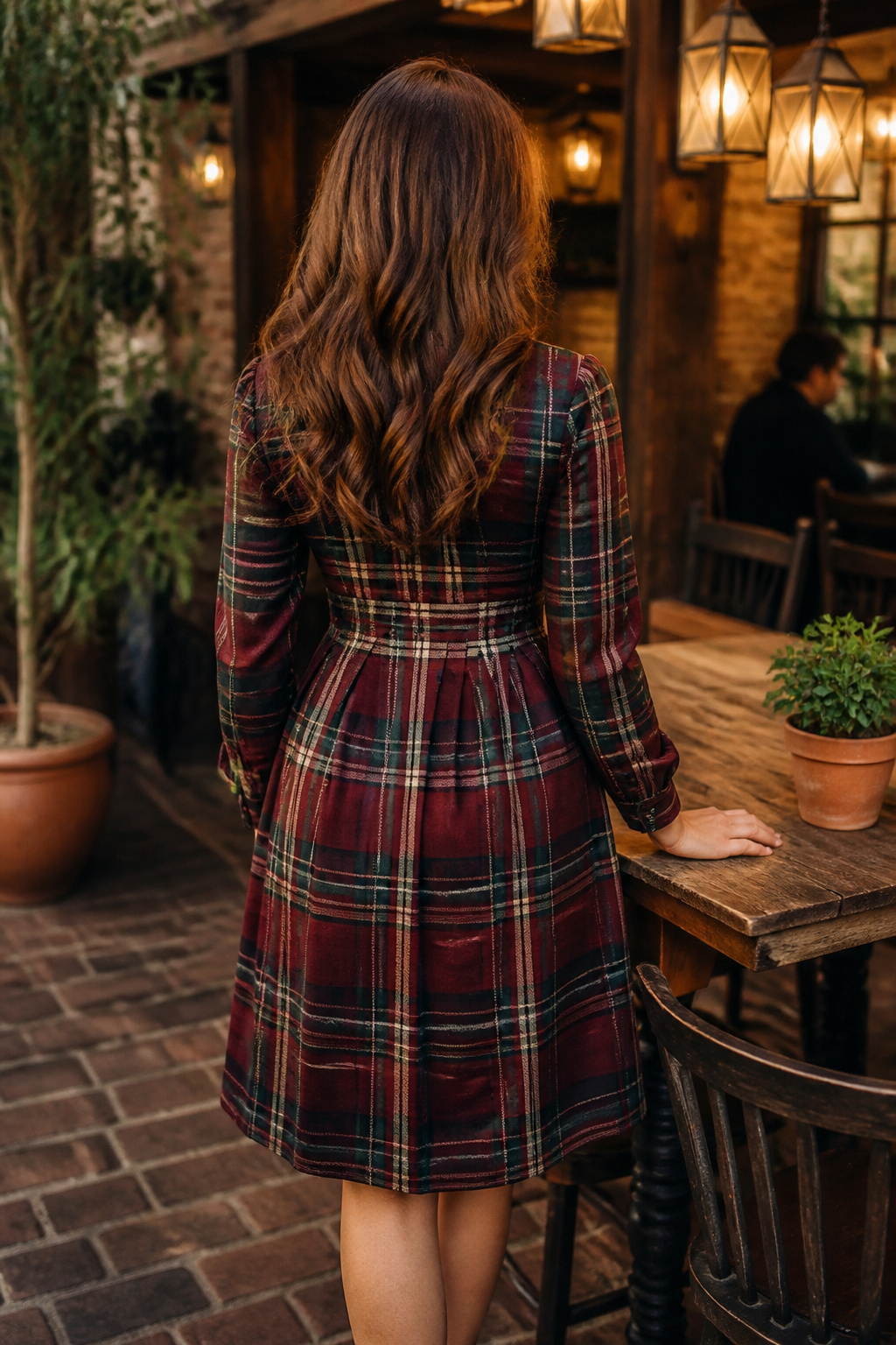 A plaid dress in burgundy and green.