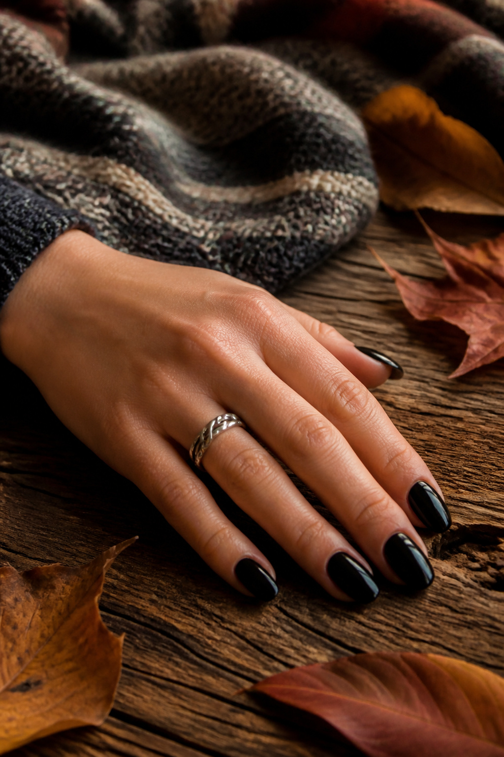 20 Fall Nail Ideas for 2026: Colors, Shapes & Textures 14 Cream black nails displayed on a stylish surface.