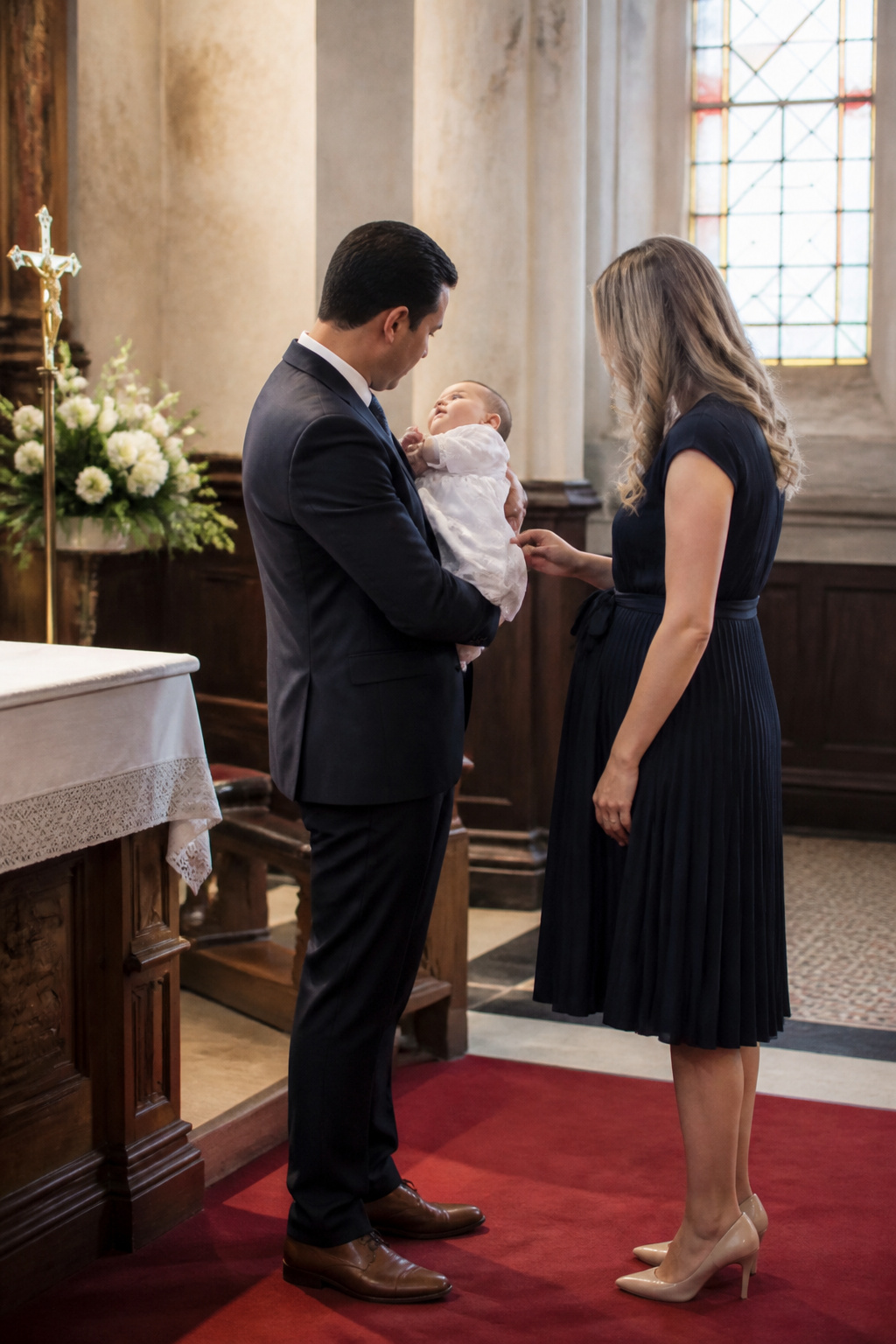 Maternity Dresses: Styles for Every Stage and Occasion 13 Expectant mother wearing a modest dress at a church christening.