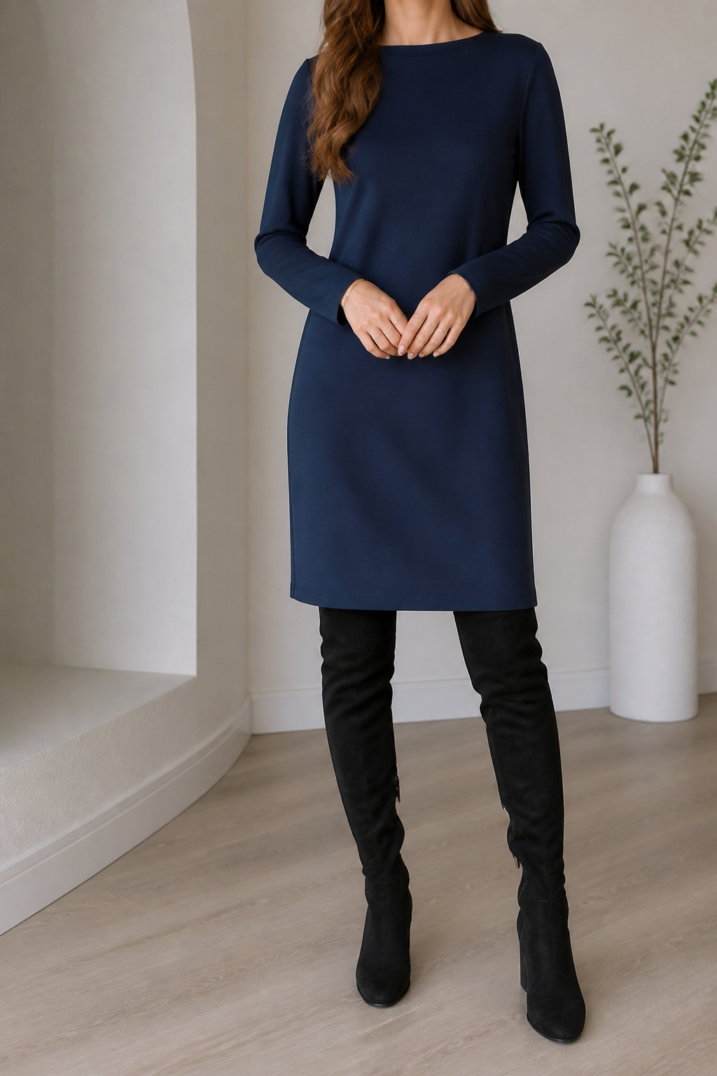 21 Over the Knee Boot Outfits for 2026 11 Navy column dress styled with black over-the-knee boots.