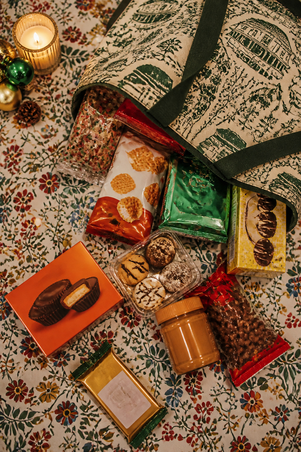 A Trader Joe's canvas tote bag stuffed with snacks and treats.