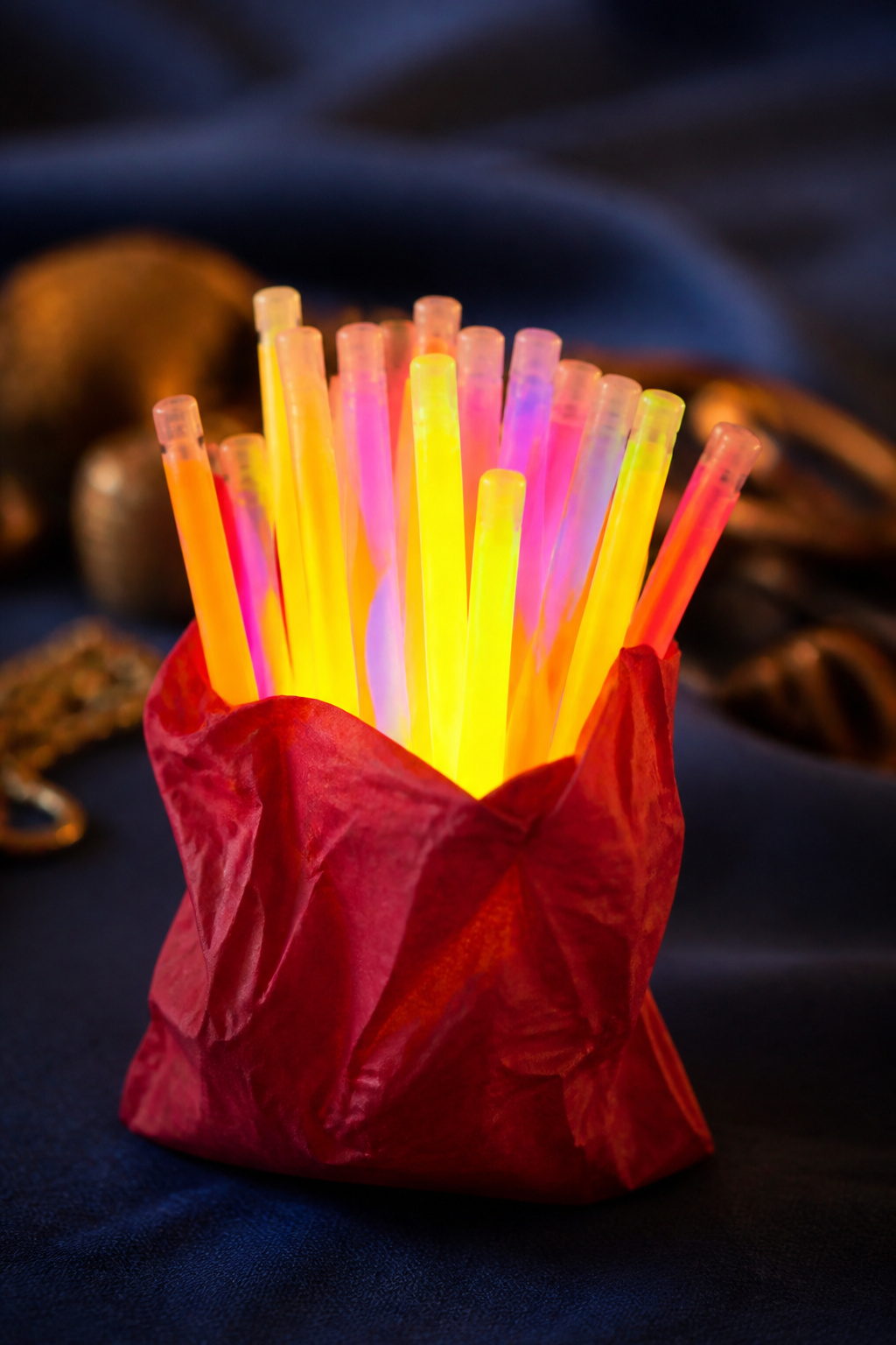 A collection of glow sticks in various shapes and colors.