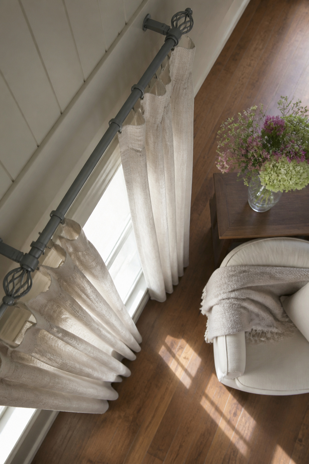 Painted curtain rods and finials in a bright color.