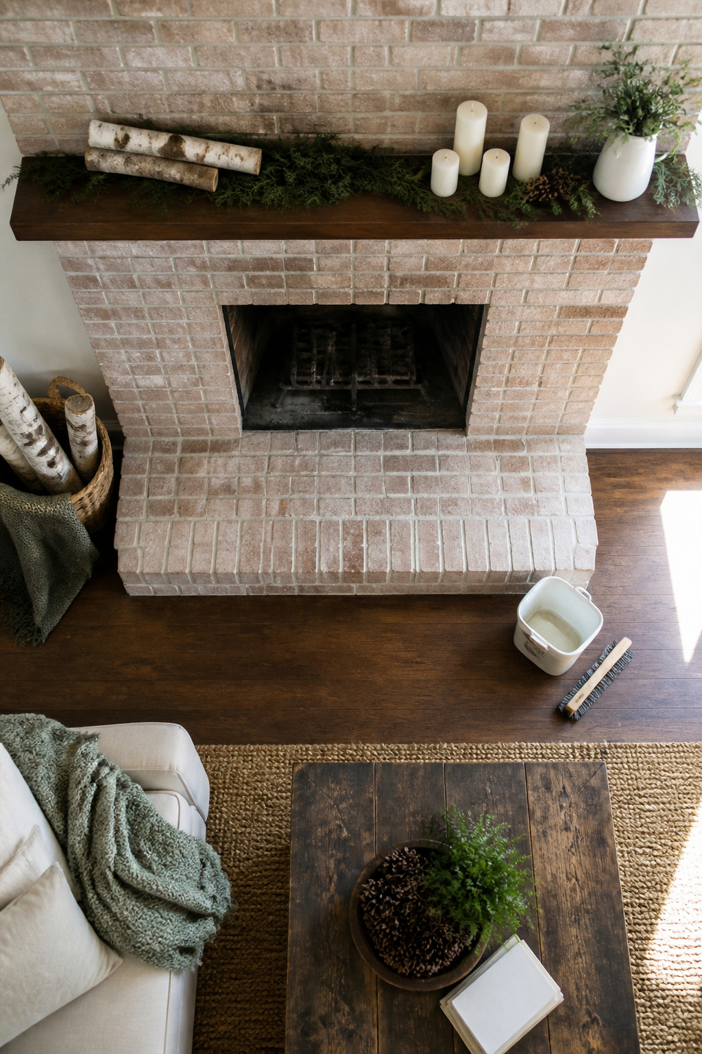 Cleaning tools and supplies for maintaining a fireplace.