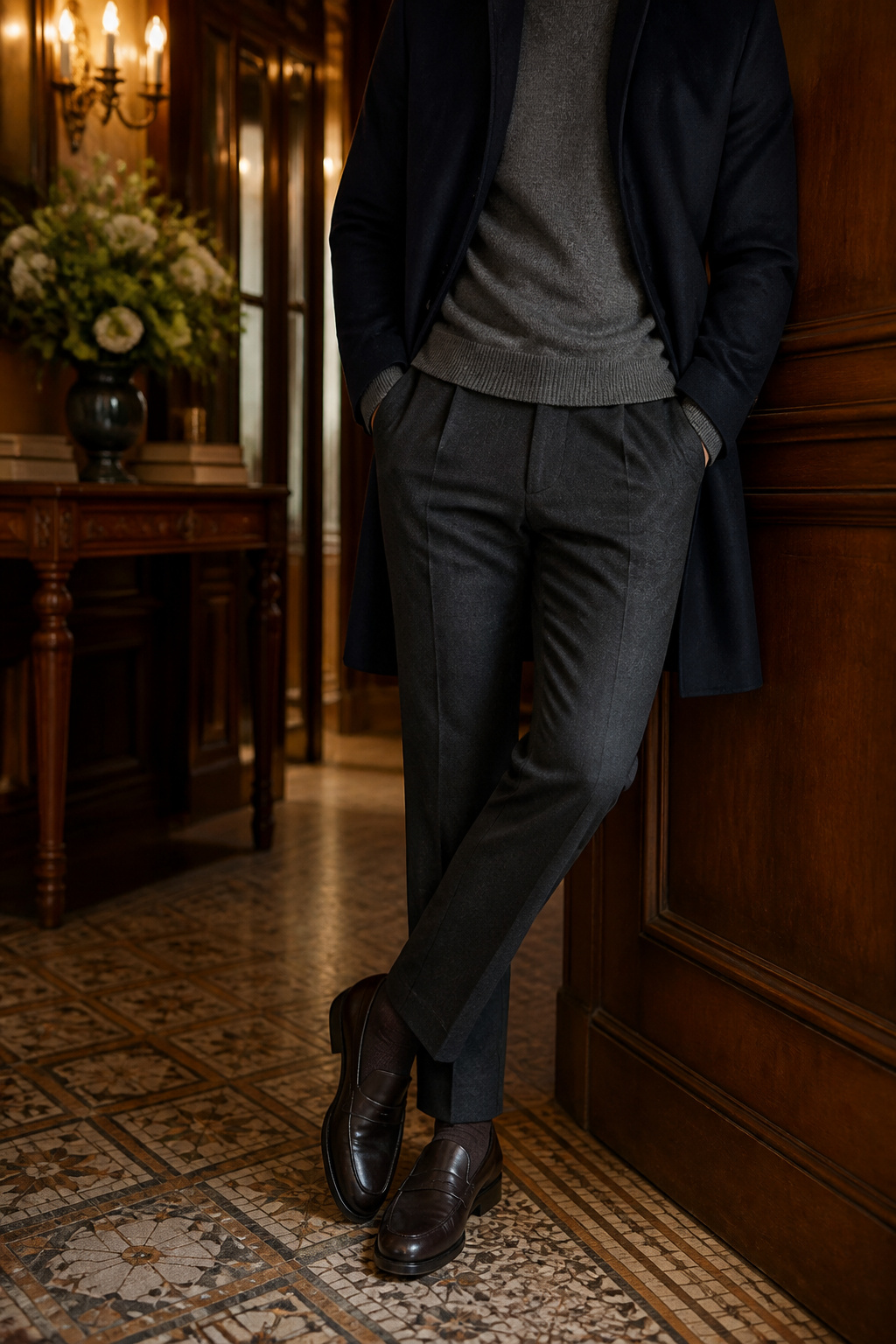 Leather loafers in a warm hallway setting.
