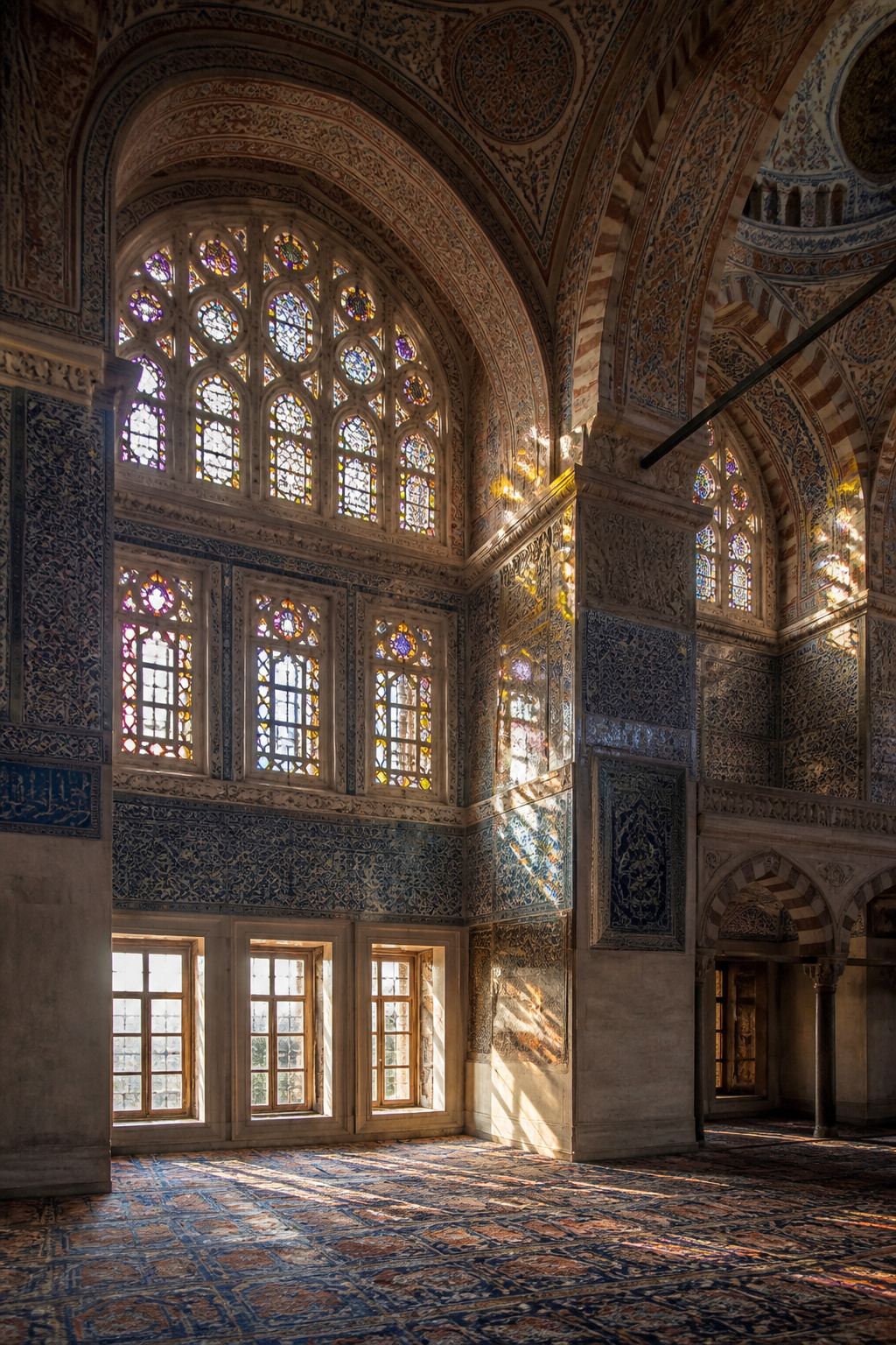 Painted glass roundels in the Blue Mosque allowing light to filter through.