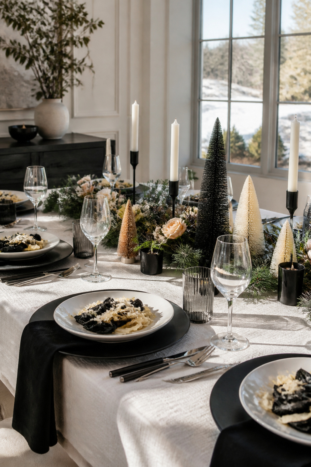 6 Black and White Table Setting Ideas for 2026 6 Winter table setting featuring black and white pasta on a white tablecloth.