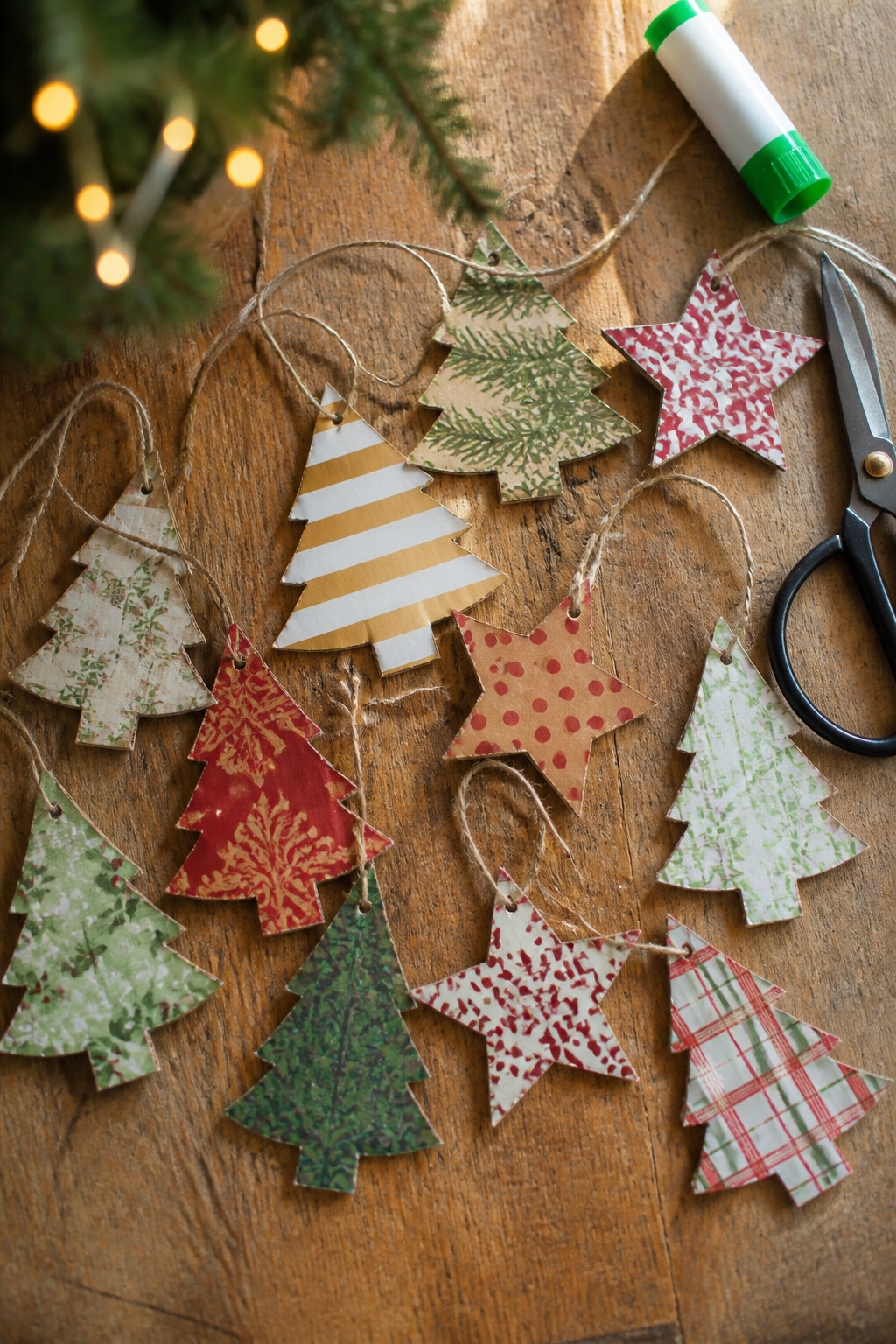 40 DIY Christmas Ornaments to Make in 2026 22 Cardboard ornaments cut into shapes and decorated.