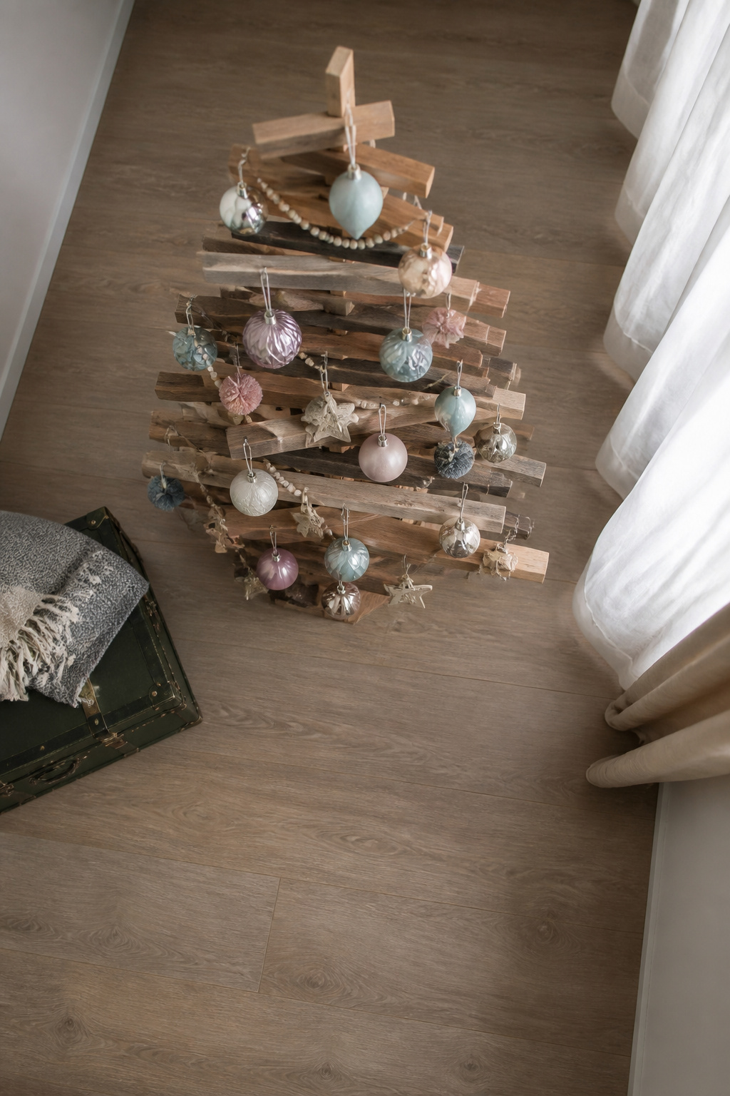 Christmas tree constructed from various pieces of scrap wood.