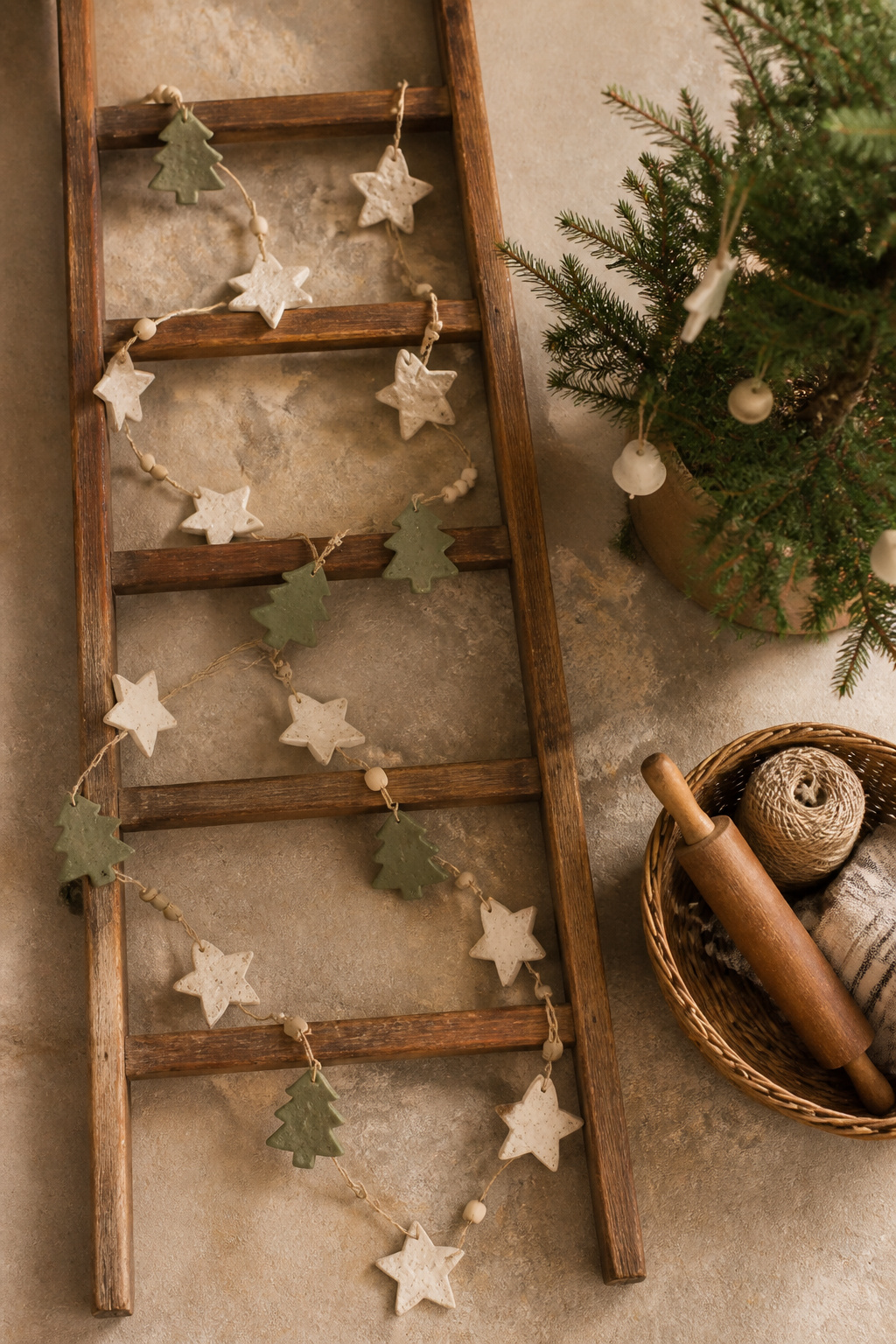 8 Rustic Christmas Garland Ideas for 2026: Wood, Pinecones, Citrus & More 6 Salt dough ornaments shaped like stars and trees on a garland.