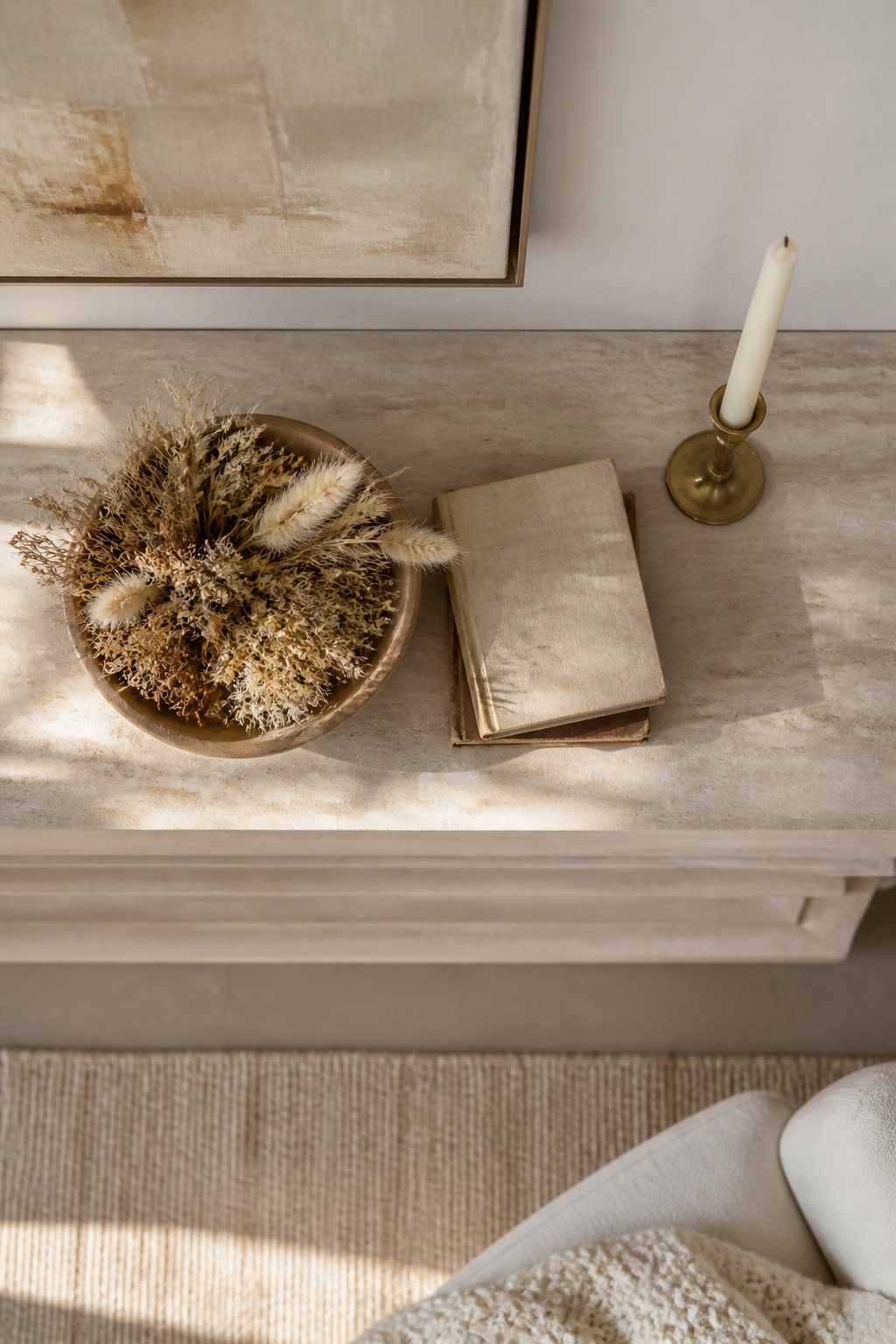 8 Summer Mantel Decorating Ideas for a Fresh, Seasonal Hearth in 2026 8 A simple mantel with a mirror, a vase, and one candle.