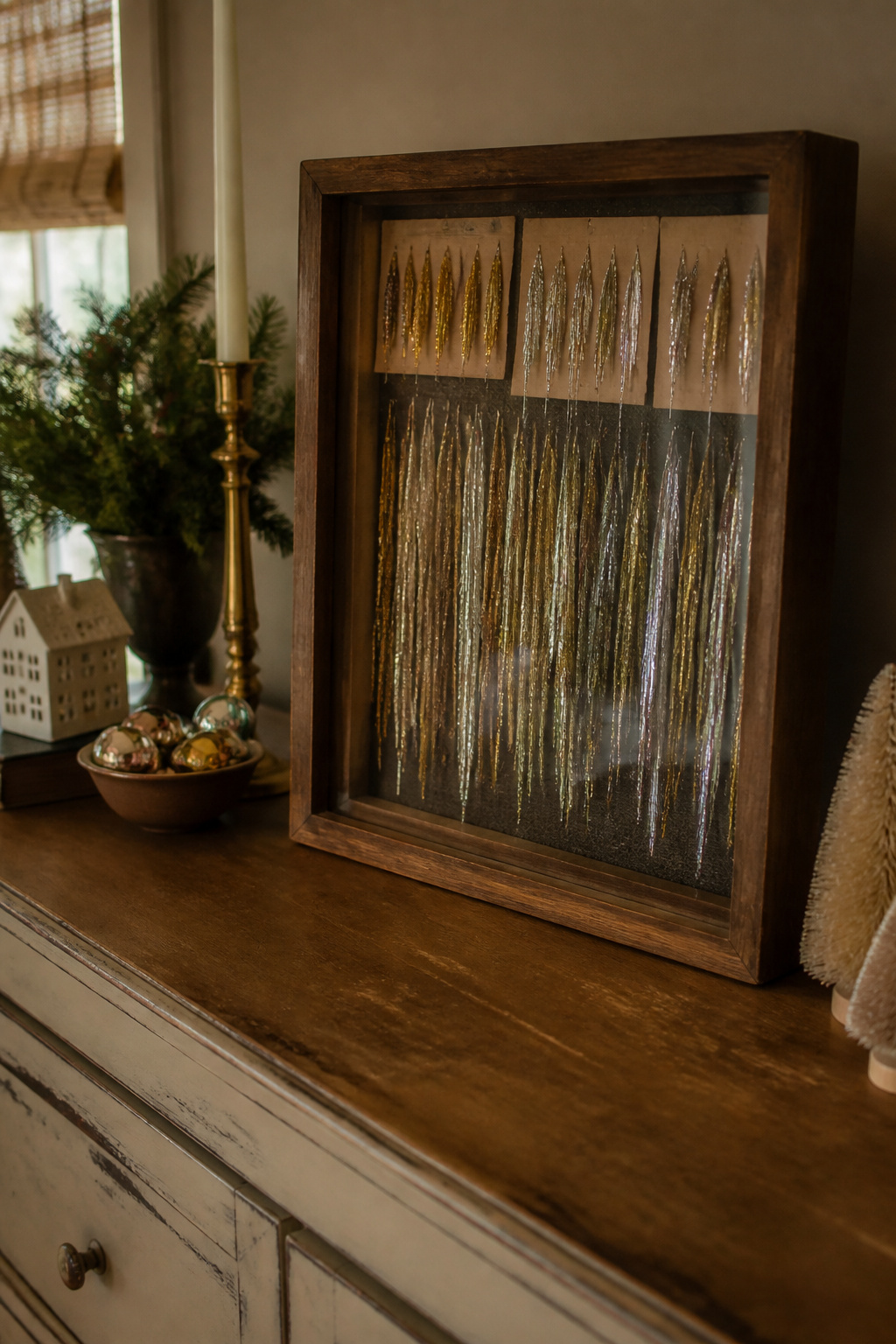 Vintage Christmas Display: Ornaments, Trees, Cards & Ephemera 5 A display of vintage tinsel icicles in a shadow box.