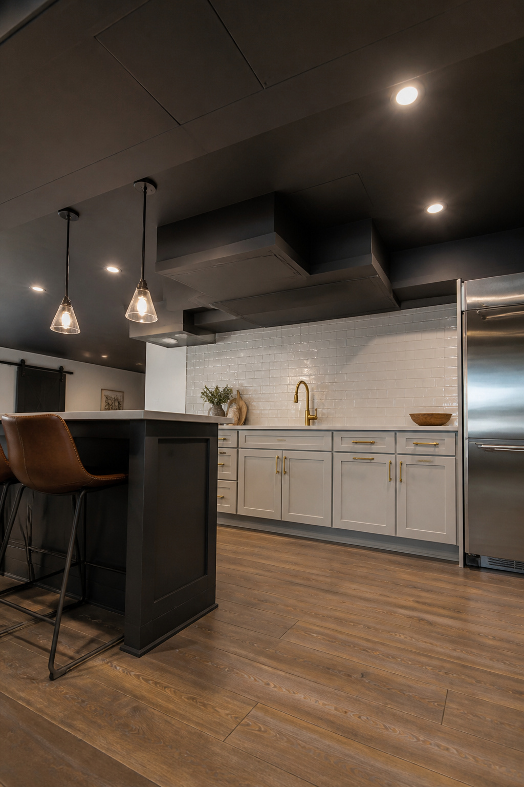 Finished ceiling design in a basement kitchen.