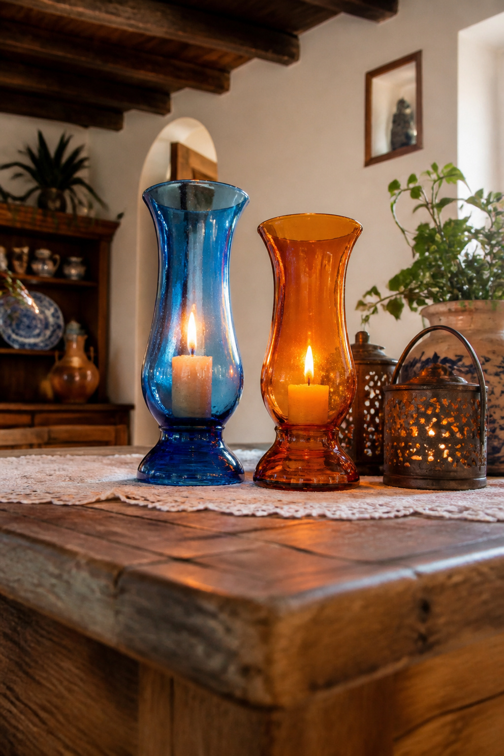 A collection of punched tin and handblown glass candle holders.