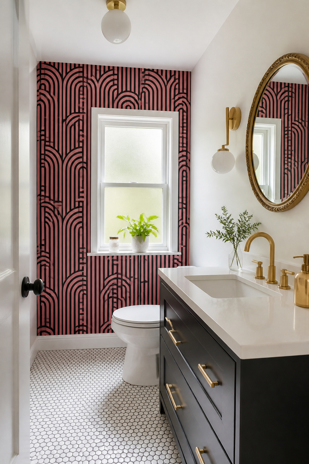 A small bathroom with striking pink and black wallpaper on one wall.