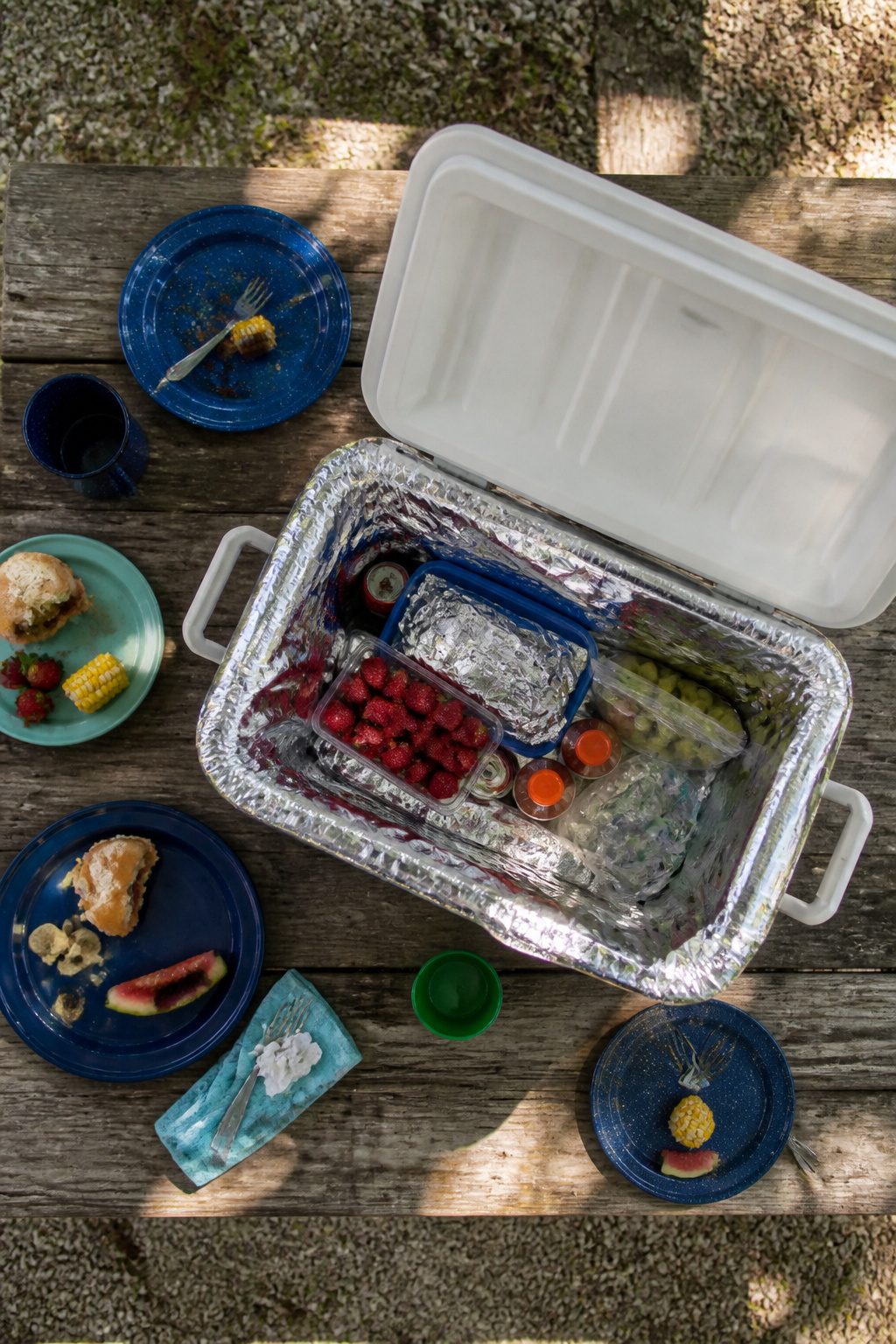 A mylar blanket inside a cooler to insulate food.