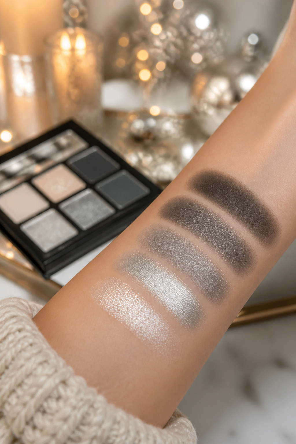 26 Christmas Eye Makeup Ideas for the 2026 Holiday Season 17 A close-up of silver bells smoky eyeshadow with gray and silver tones.