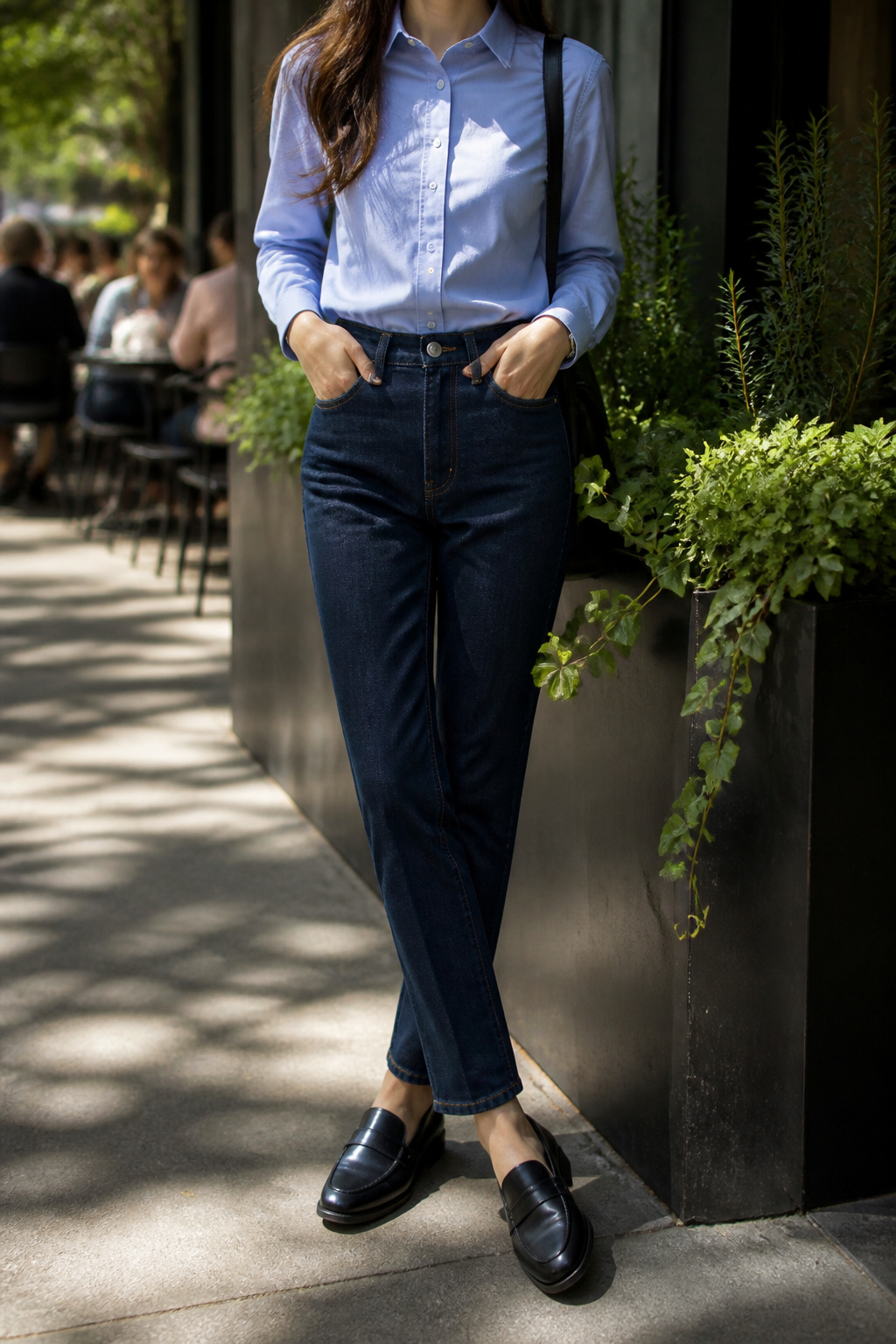 What to Wear This Spring: 7 Cute Spring Outfits for 2026 3 Mid-tone blue button-up with dark jeans and black loafers.